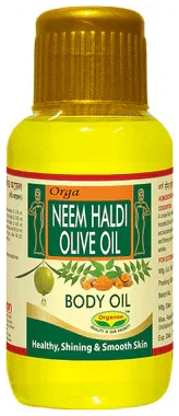 Organon Neem Haldi Olive Body Oil bottle of 100 ml oil